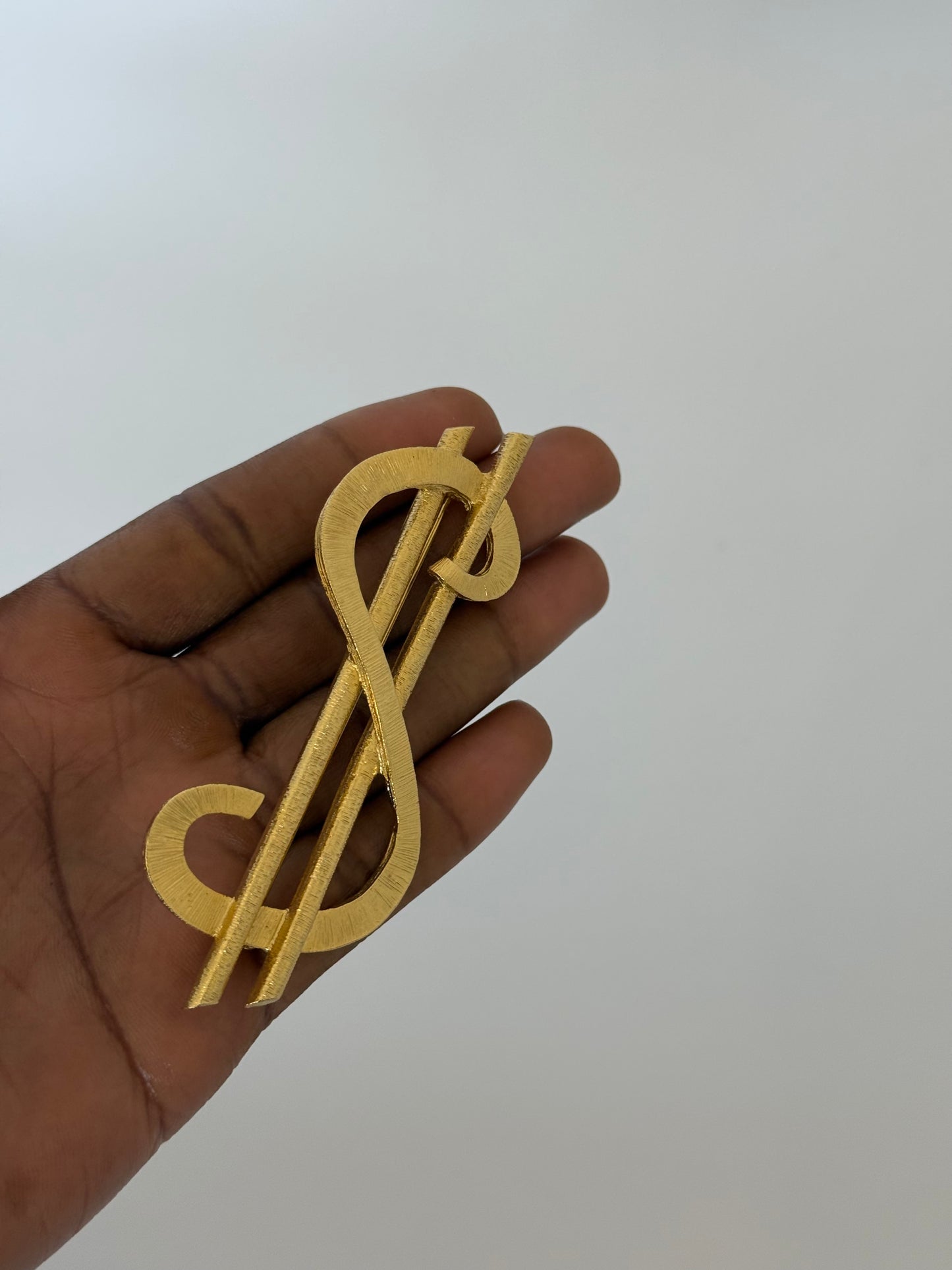 Vintage Sculptural Gold Dollar Sign Brooch